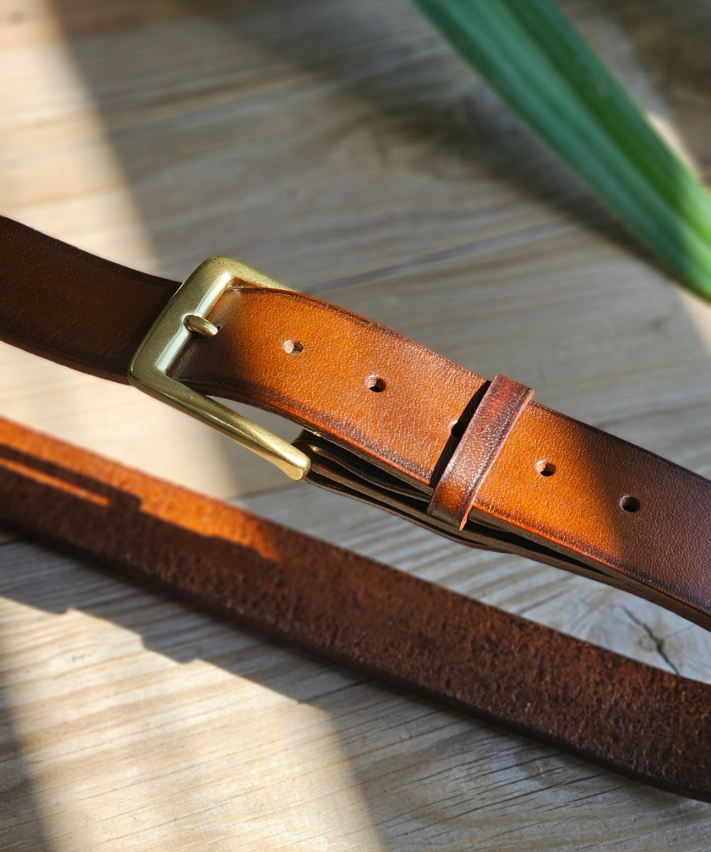 Solid Brass Buckle with fullgrain veg tanned highly finished leather belt in pakistan with 10 years warrent of hardware and belt breakability.